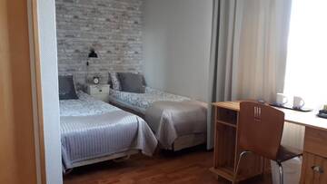 Фото номера Двухместный номер с 2 отдельными кроватями Апарт-отели Majoitus Hermanni г. Teuva 12