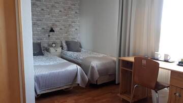 Фото номера Двухместный номер с 2 отдельными кроватями Апарт-отели Majoitus Hermanni г. Teuva 23